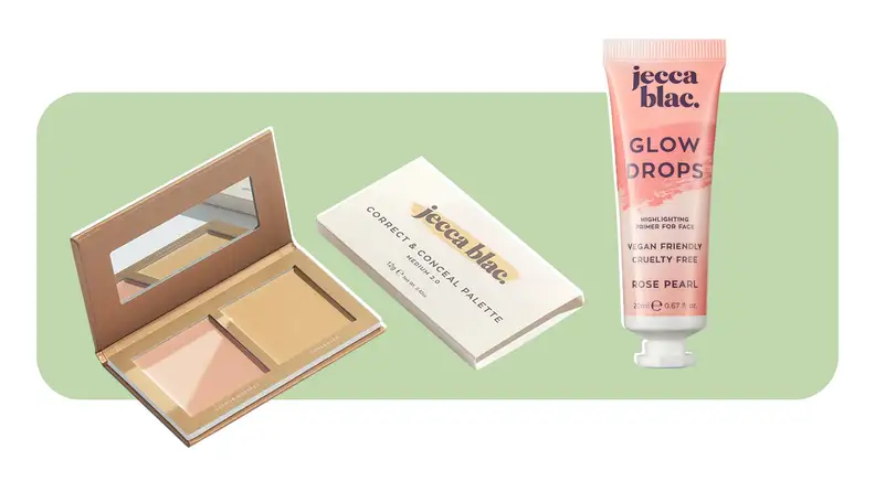 A concealer compact with two colors sits next to a tube of face glow drops.