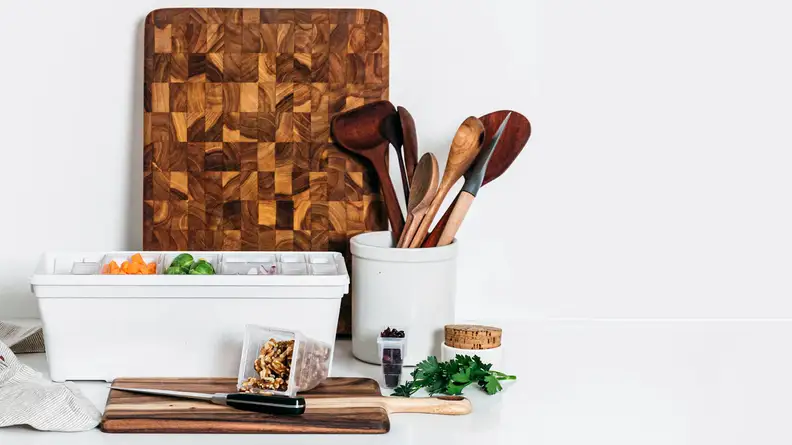 The Fresh Prep delivery caddy on a counter amongst various cooking equipment.