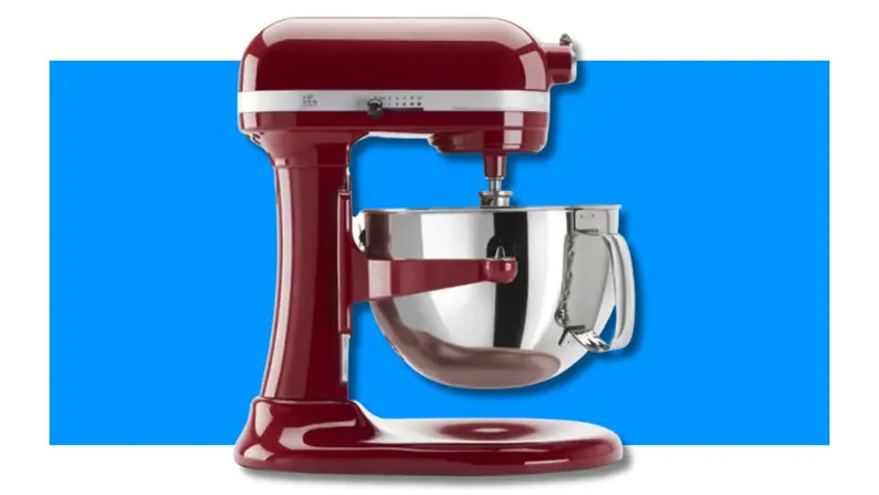 KitchenAid stand mixer on blue background