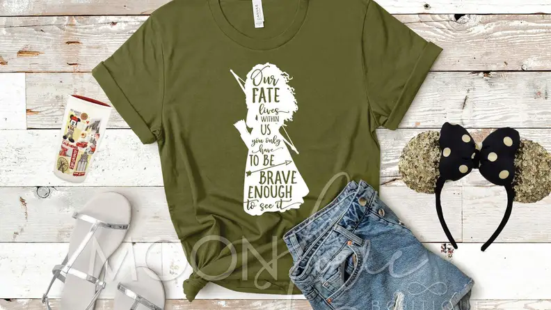 Graphic shirt with  “Our fate lives within us; you only have to be brave enough to see it.”