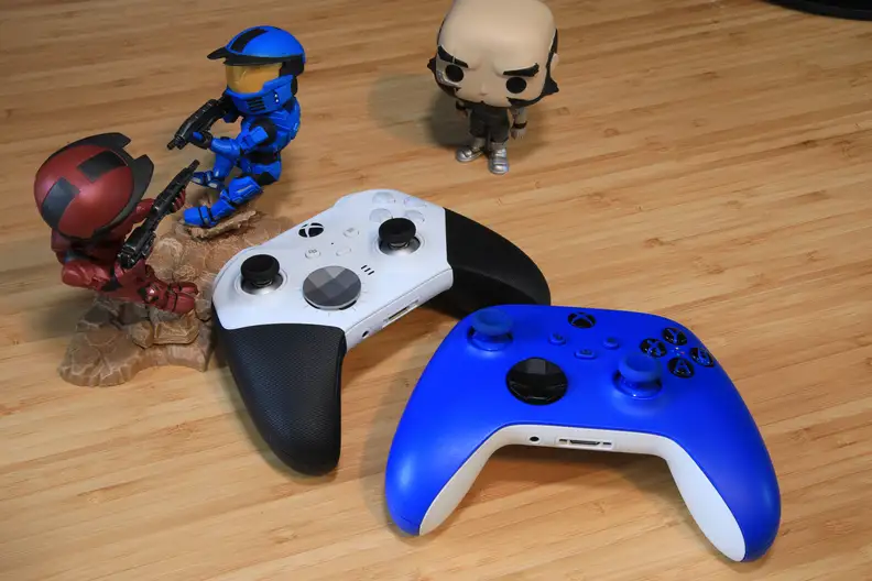 An Xbox Elite Wireless Core controller and a normal Xbox wireless controller