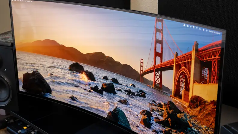View of Alienware 39 5K OLED Gaming Monitor (AW3926QW) showing reflection from background light.