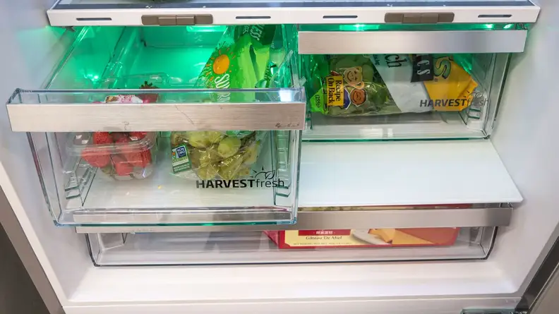 Chilled fruits and vegetables stored inside HarvestFresh storage drawers.
