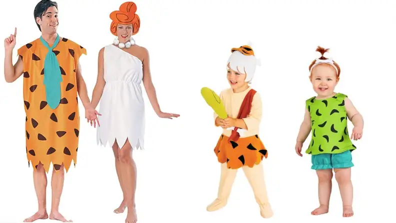 A family dressed as Fred, Wilma, Bam-Bam, and Pebbles from the Flintsones