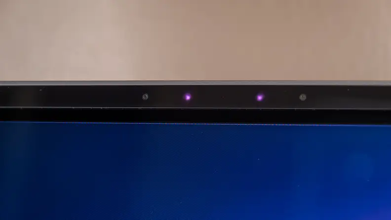 The top of a monitor with two purple lights