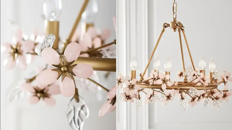 This chandelier is covered in glass flowers and is a wonderful way to add Regency era decor to your space.
