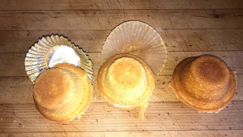 The results of  three cupcakes baked in different cupcake liners.