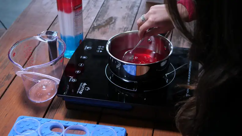 Stirring red Jell-O