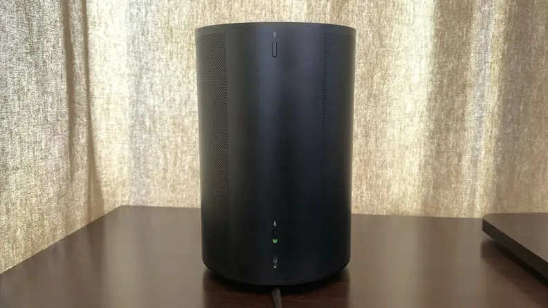 The black Sonos Era 100 on a table.