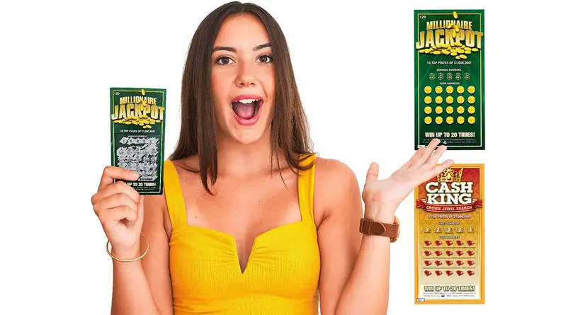 Girl with shocked expression holding fake scratch off tickets.