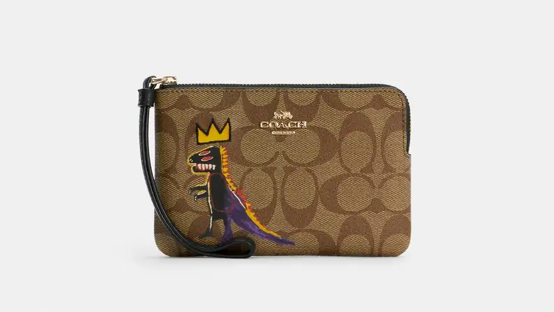 Small brown Coach wristlet purse