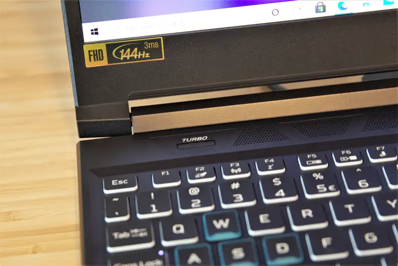 An Acer Predator Helios 300 gaming laptop on a desk.