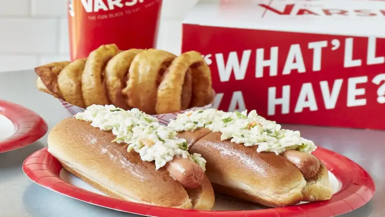 Two chili slaw dogs with onion rings from The Varsity