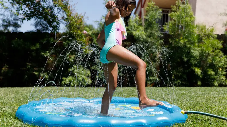 This toy is a sprinkler, a splash pad and a kiddie pool all in one.