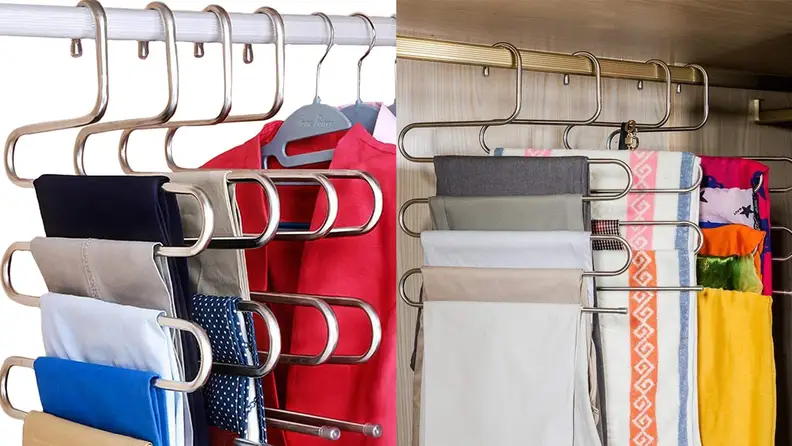 Multi-layer hangers holding scarves and pants.