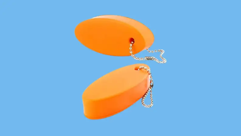 A pair of floating foam keychains by Cornucopia.