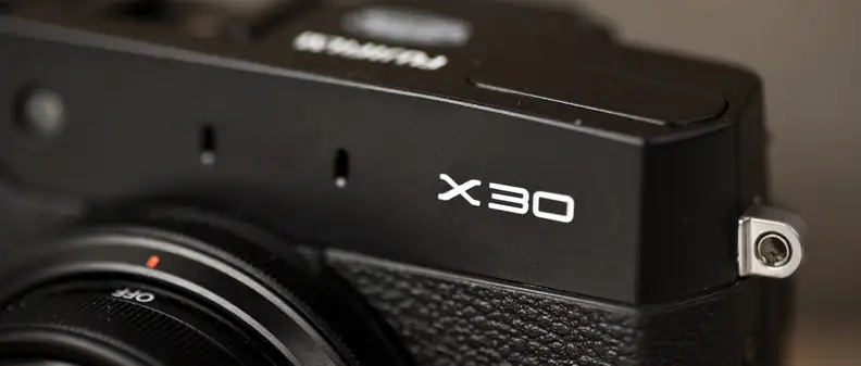 A photo of the Fujifilm X30's logo.
