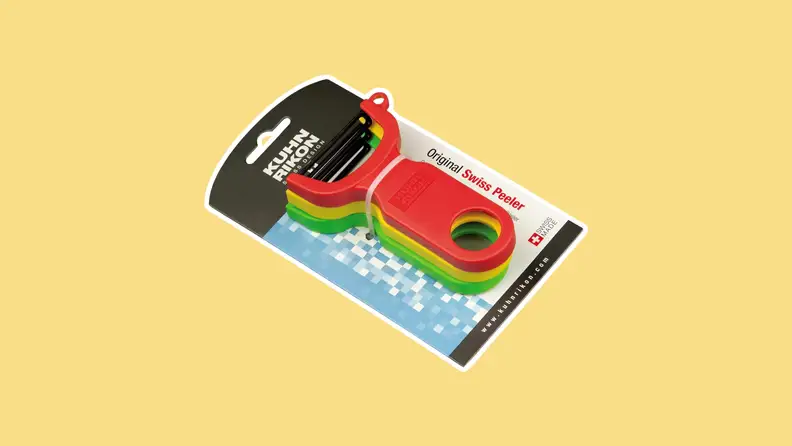 The Kuhn Rikon Original Swiss Peeler 3-Pack in colors red, yellow, and green.