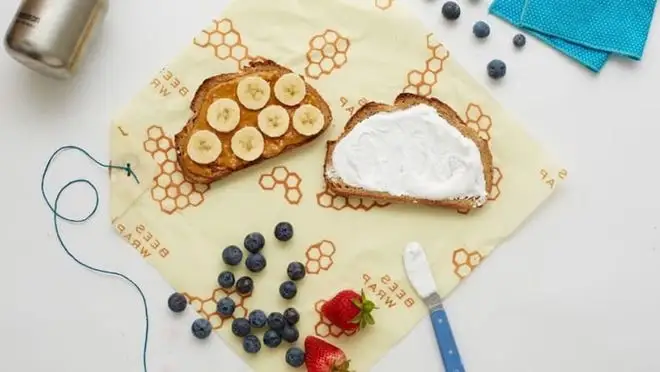 Toast and berries on top of Bee's Wrap