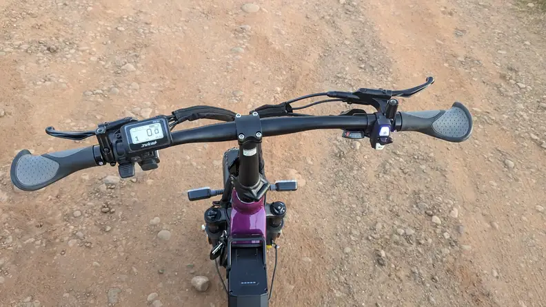 The handle bar of a Juiced JetCurrent Pro e-bike.