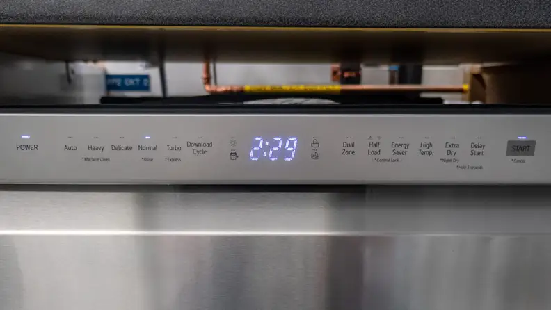 The control panel of an LG dishwasher with a power saving energy saver cycle.