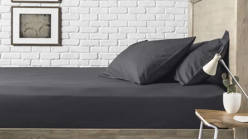 Crisp percale sheets are perfect for summer.