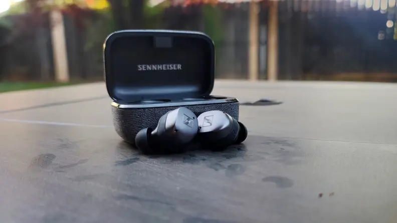 Sennheiser Momentum True Wireless 3 sitting in front of case