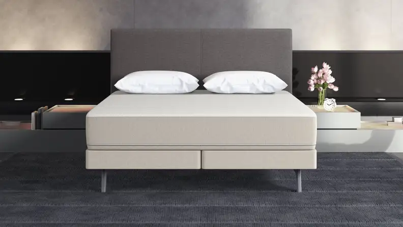 Sleep Number 360 i8 mattress without bed sheets and between nightstands