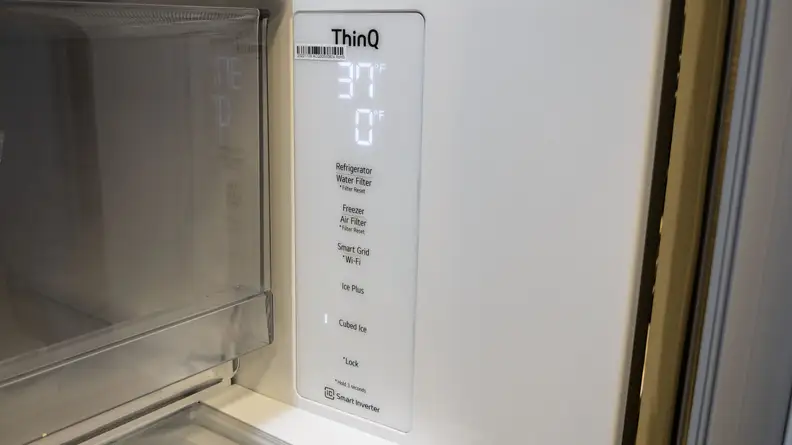 A close-up of the fridge's control panel, located on the right-side interior wall.
