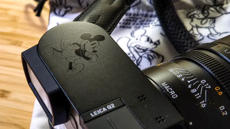 A closeup of a Mickey Mouse graphic printed onto the Leica Q2's body.