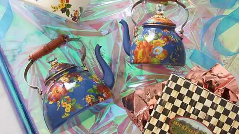Two colorful tea kettles