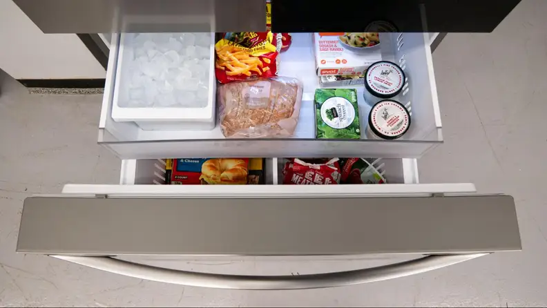 Extra compartments open with food inside.