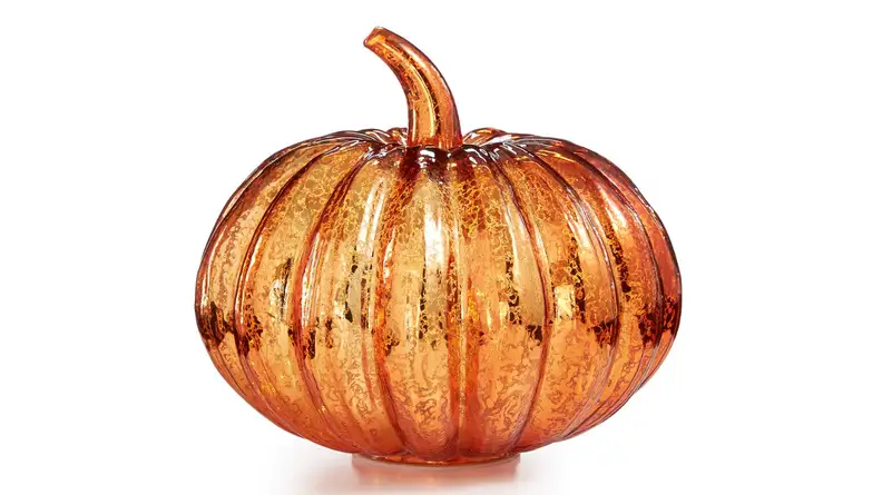 An image of an orange mercury glass pumpkin with lights inside.