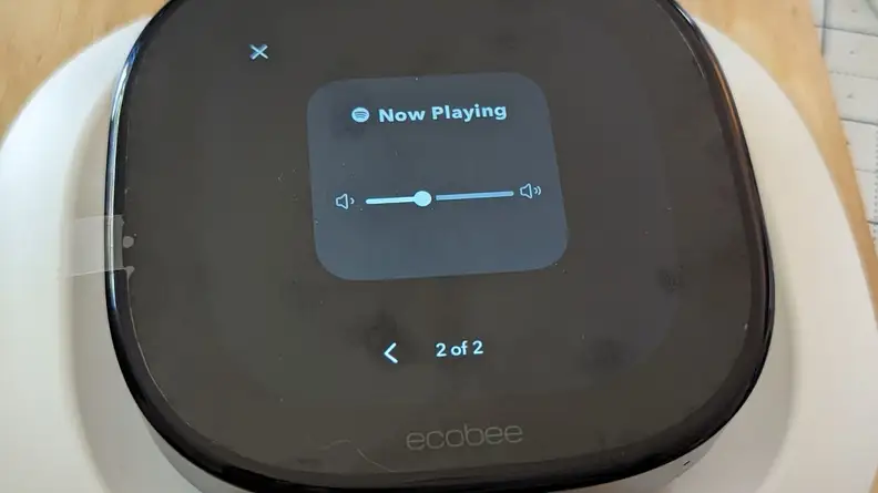 The Ecobee Smart Thermostat Premium is shown with Spotify playing on its screen.