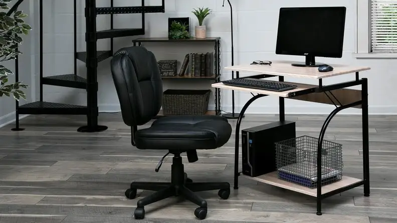 This small computer desk will tuck into any corner.