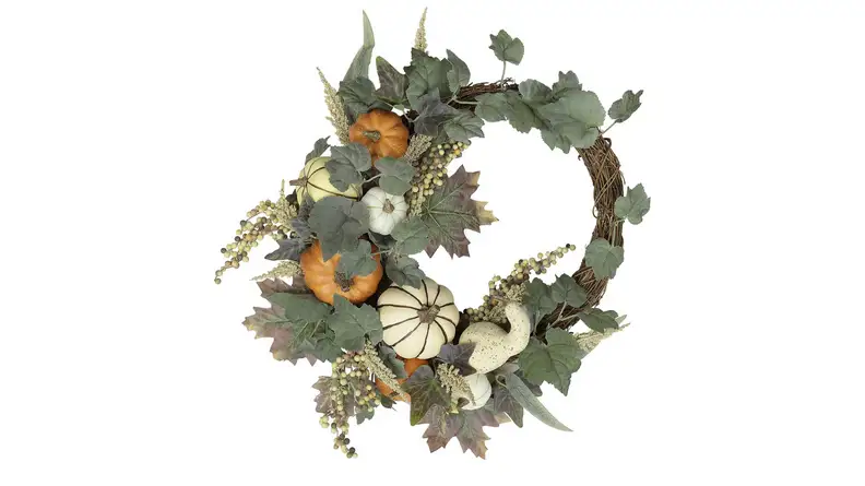 An image of an asymmetrical wreath with pumpkins, gourds, and greenery.