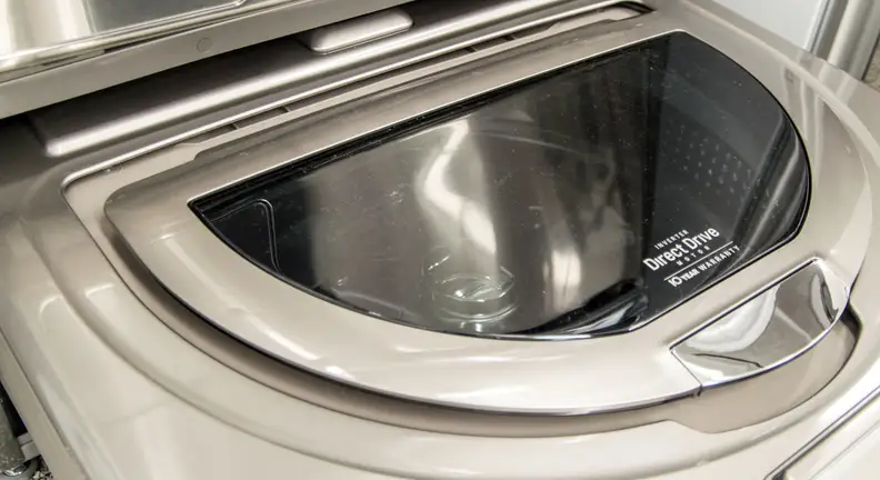 The Sidekick is a small unit, only able to hold about one cubic foot of laundry.