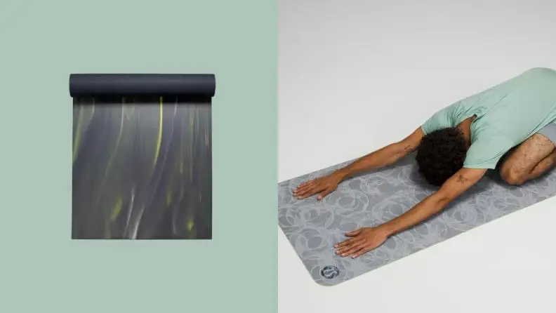 A person stretches on a yoga mat.