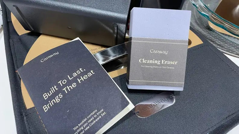 Cleaning eraser on top of pot lid inside of sleeve.