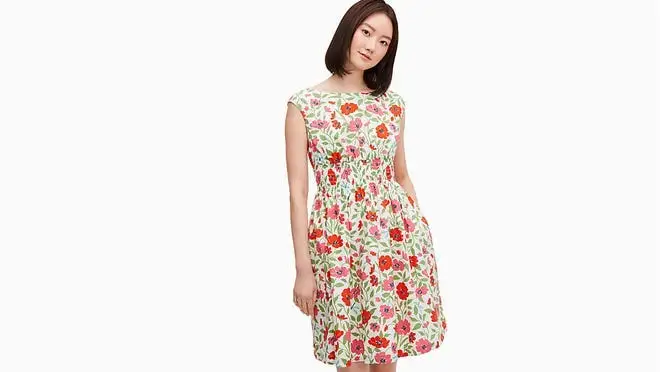 White short dress with pink, red, and green floral pattern
