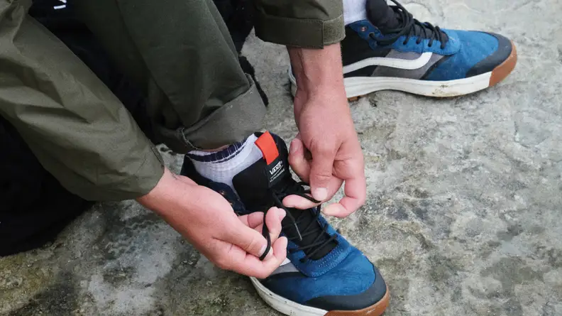 Blue sneakers.