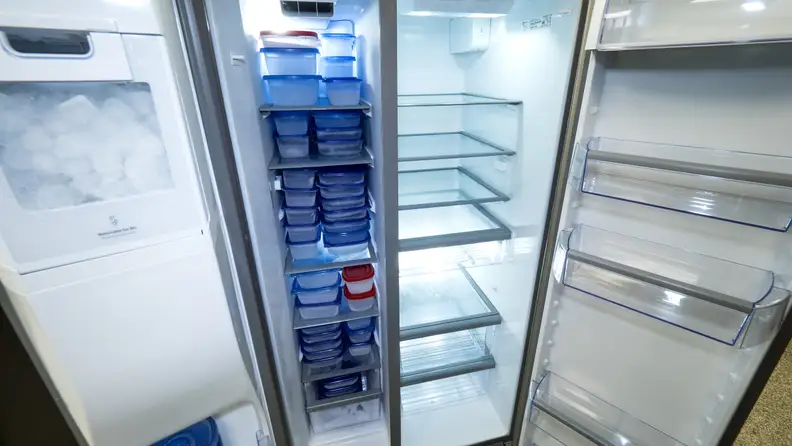 The bins on the right are deep enough for gallon containers