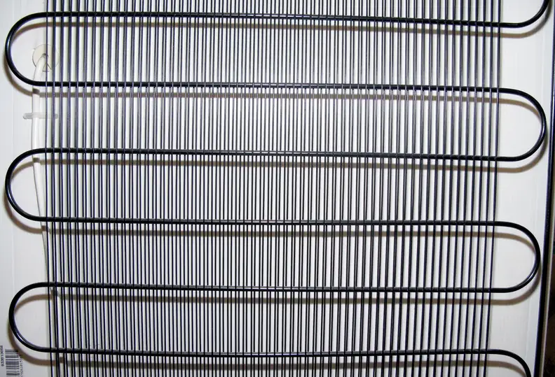 A typical fridge condenser unit