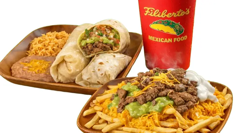 A burrito plate with rice and beans, next to loaded fries with steak and guacamole