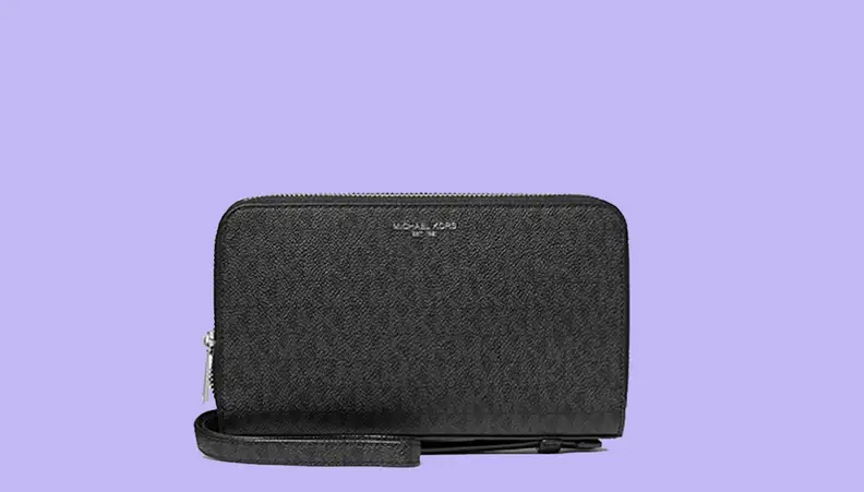 Black wallet against purple background