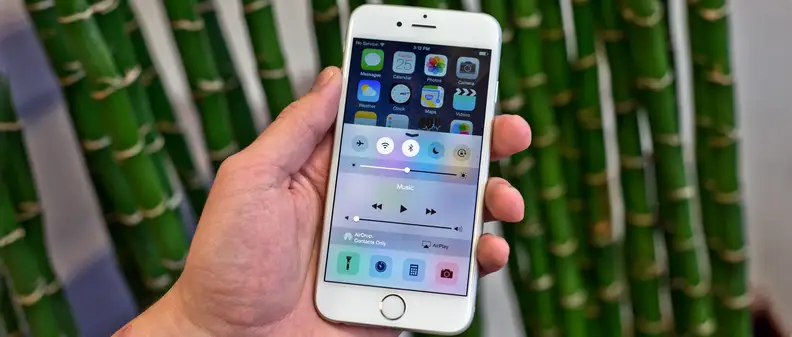A photo of the Apple iPhone 6 and its quick settings panel.