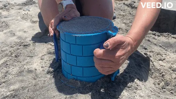 A gif of someone opening the clasps of Create-a-Castle