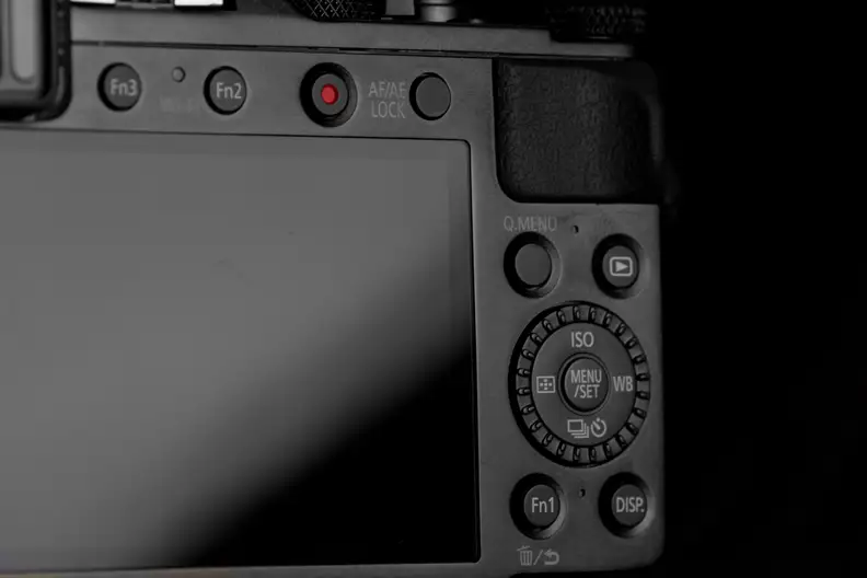 A photograph of the Panasonic Lumix LX100's rear controls.