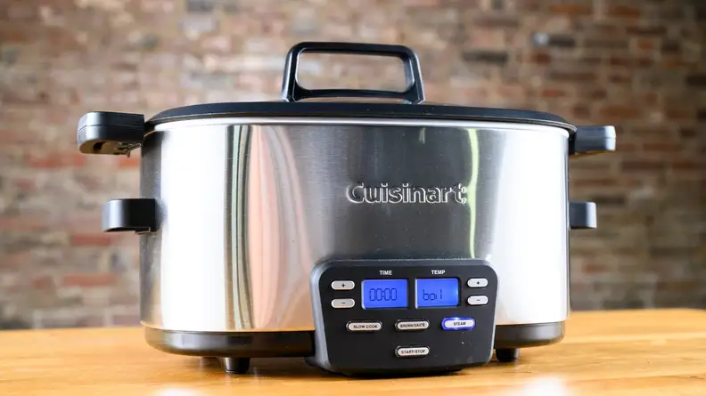 The best slow cooker, the Cuisinart 3-in-1, on a wooden surface