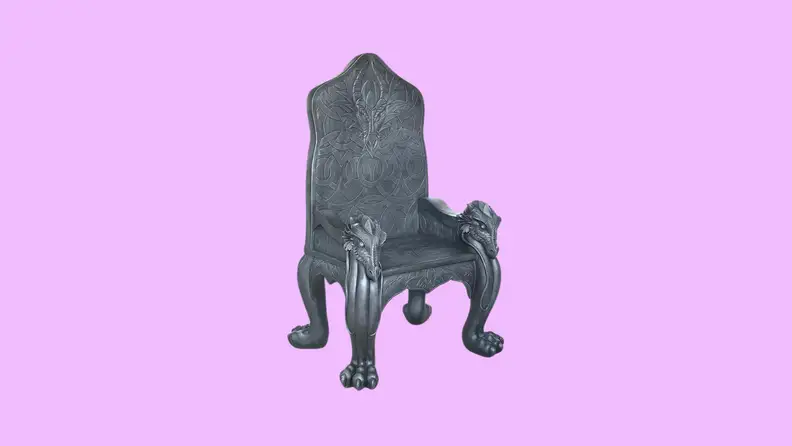 A dragon throne in front of a background.
